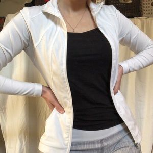 White stretchy activewear sports sweater